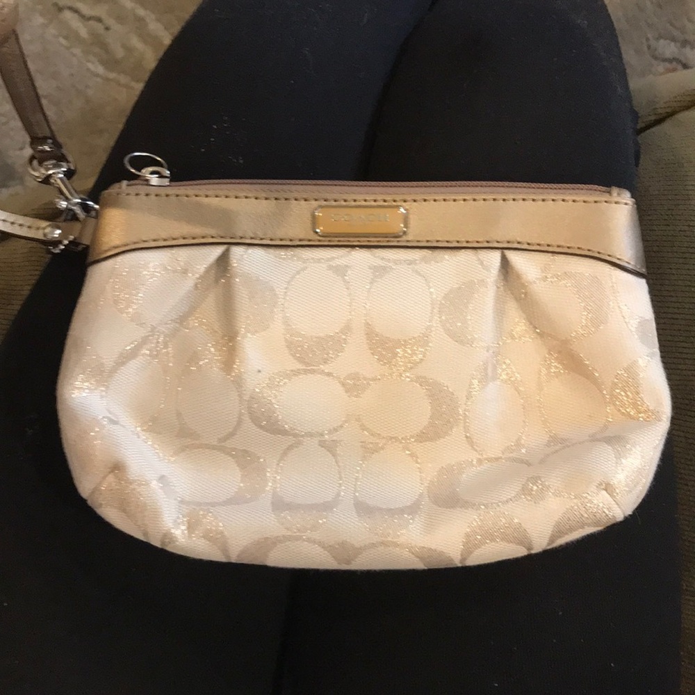 COACH tan and cream clutch